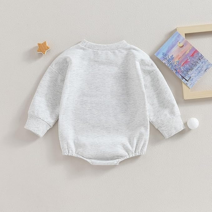 Lil Bro Vibes Baby Boys Romper by Ju Ju Jam, featuring a comfy sweatshirt material and bold 'Lil Bro' graphic for a cute and casual look.