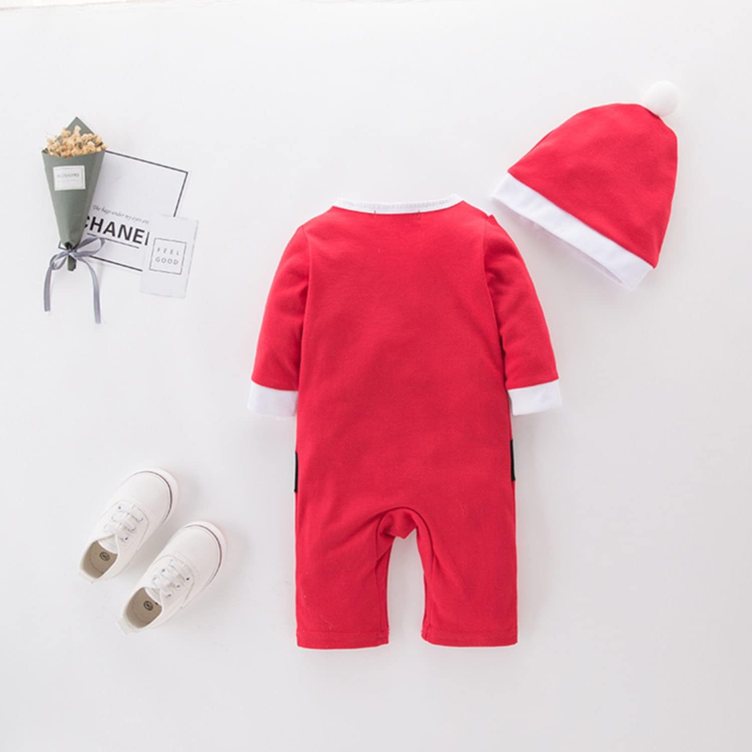 Festive Little Santa romper for baby boys, designed by Ju Ju Jam for a cute and cozy Christmas look.